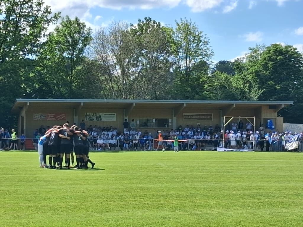 Team auf dem Sportplatz